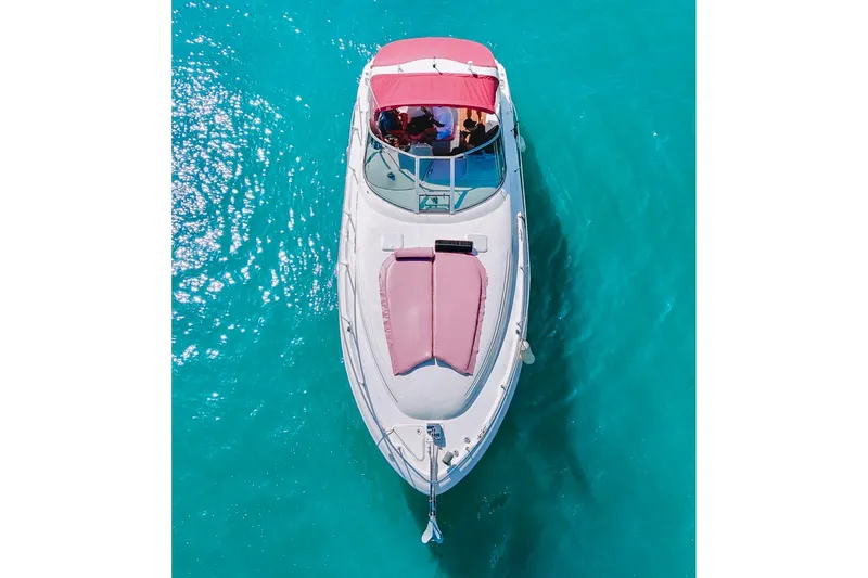 Slide: The Image of Aerial view of 2001 Sea Ray 360 Express Cruiser on turquoise water. - 8