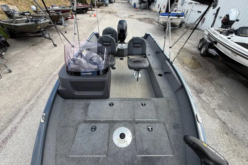 Slide: The Image of 2021 Tracker Pro Guide V-16 SC fishing boat interior with seating and equipment. - 39