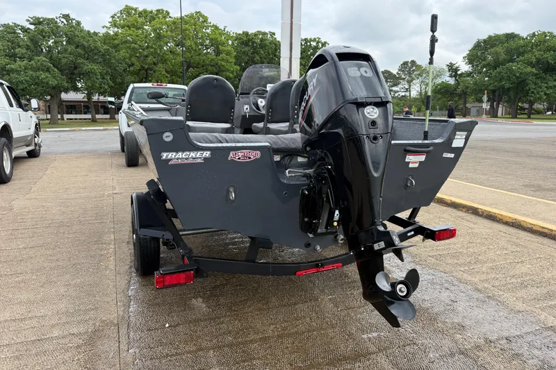 Slide: The Image of 2021 Tracker Pro Guide V-16 SC boat with Mercury outboard motor on trailer. - 54