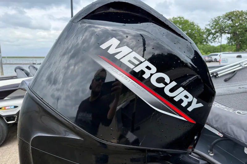 Slide: The Image of Mercury FourStroke engine on 2021 Tracker Pro Guide V-16 SC boat, close-up view. - 62