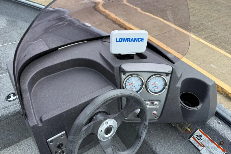 Slide: The Image of 2021 Tracker Pro Guide V-16 SC boat dashboard with Lowrance GPS and gauges. - 73