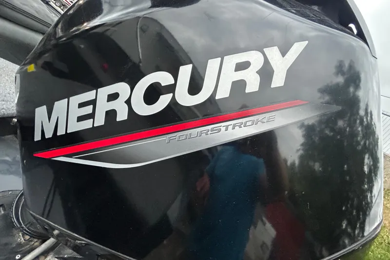 Slide: The Image of Mercury FourStroke engine on 2021 Tracker Pro Guide V-16 SC boat. - 8