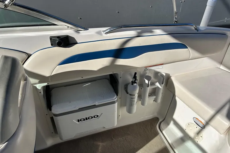 Slide: The Image of Interior of a 2001 Chaparral 235 SSi boat with Igloo cooler and fire extinguisher. - 14