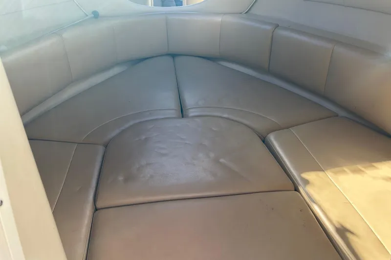 Slide: The Image of Interior cabin of 2001 Chaparral 235 SSi boat with beige seating. - 15
