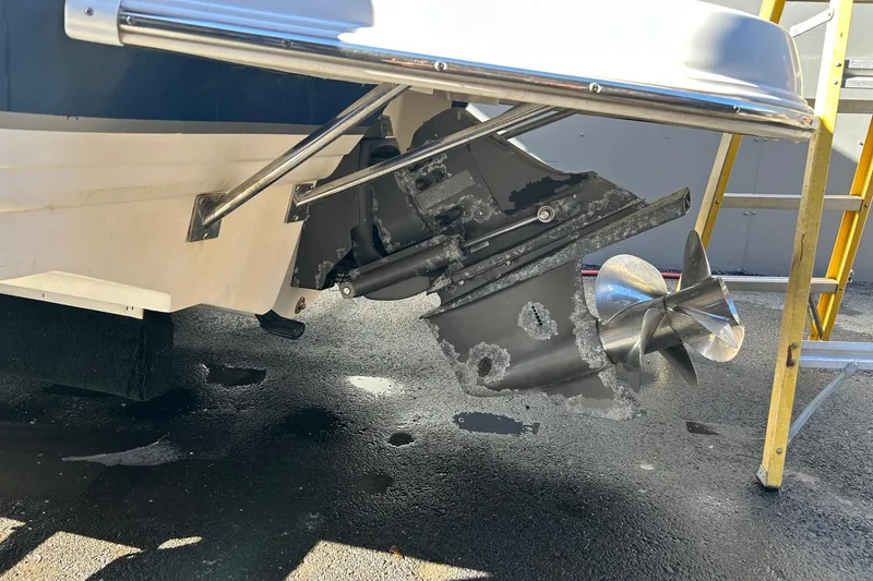 Slide: The Image of Close-up of a 2001 Chaparral 235 SSi boat's propeller and stern drive. - 4