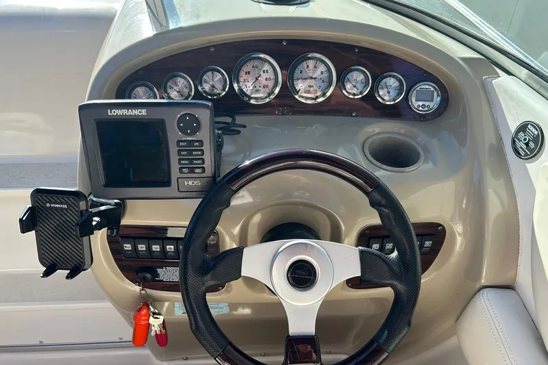 Slide: The Image of Dashboard of a 2001 Chaparral 235 SSi boat with Lowrance navigation system. - 5