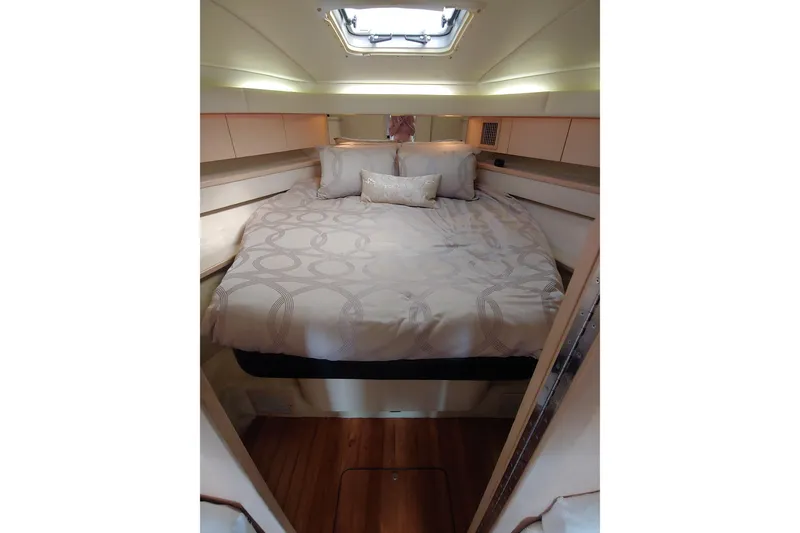 Slide: The Image of Luxurious interior of 1995 Tiara Yachts 4300 Open with elegant seating and decor. - 11