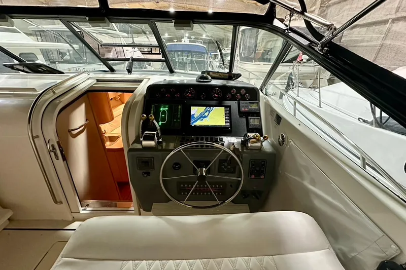 Slide: The Image of Interior view of a 1995 Tiara Yachts 4300 Open cockpit. - 21
