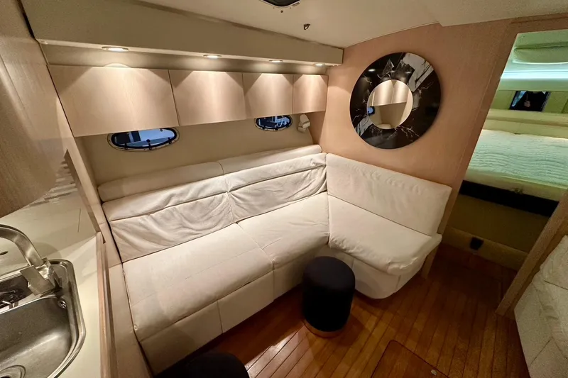 Slide: The Image of Luxurious interior of 1995 Tiara Yachts 4300 Open with plush seating and modern decor. - 28
