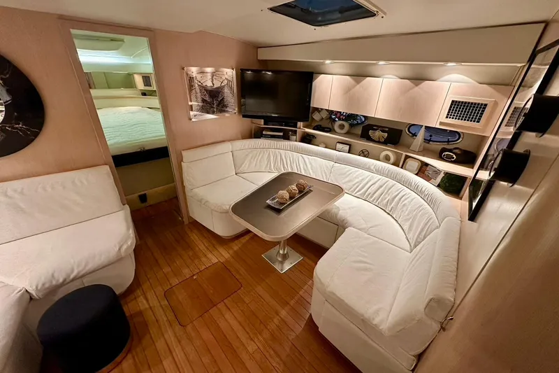 Slide: The Image of Luxurious interior of a 1995 Tiara Yachts 4300 Open, featuring elegant seating and modern amenities. - 29
