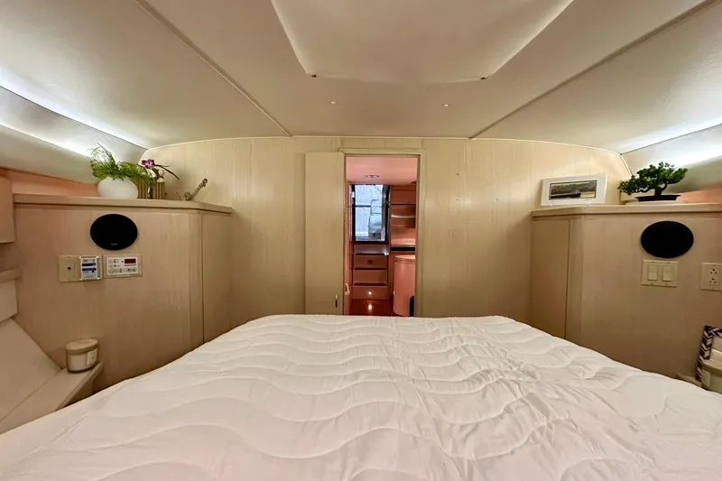Slide: The Image of Interior of 1995 Tiara Yachts 4300 Open featuring cozy bedroom. - 31