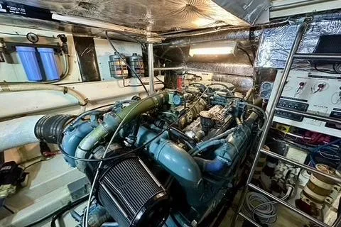 Slide: The Image of Engine room of a 1995 Tiara Yachts 4300 Open, showcasing complex machinery and components. - 33