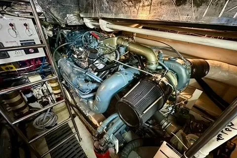 Slide: The Image of Engine room of a 1995 Tiara Yachts 4300 Open, showcasing detailed machinery. - 34