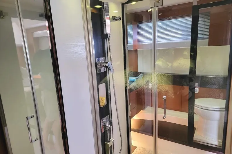 Slide: The Image of Luxurious bathroom interior of 2014 Prestige 550 yacht with modern sink and cabinetry. - 12