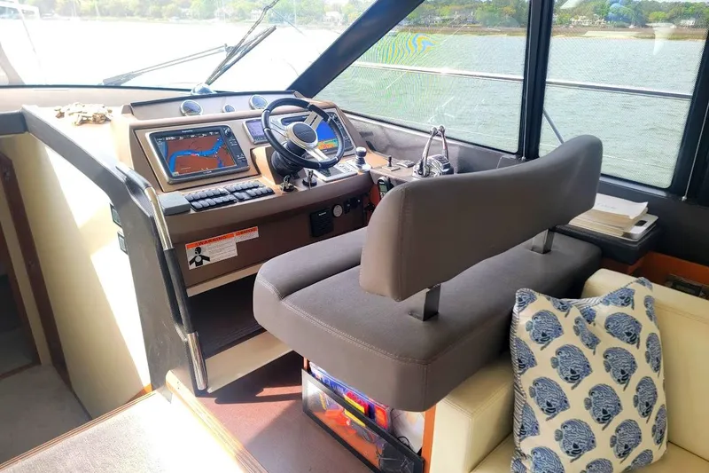Slide: The Image of Luxurious bedroom interior of 2014 Prestige 550 yacht with cozy bedding. - 16