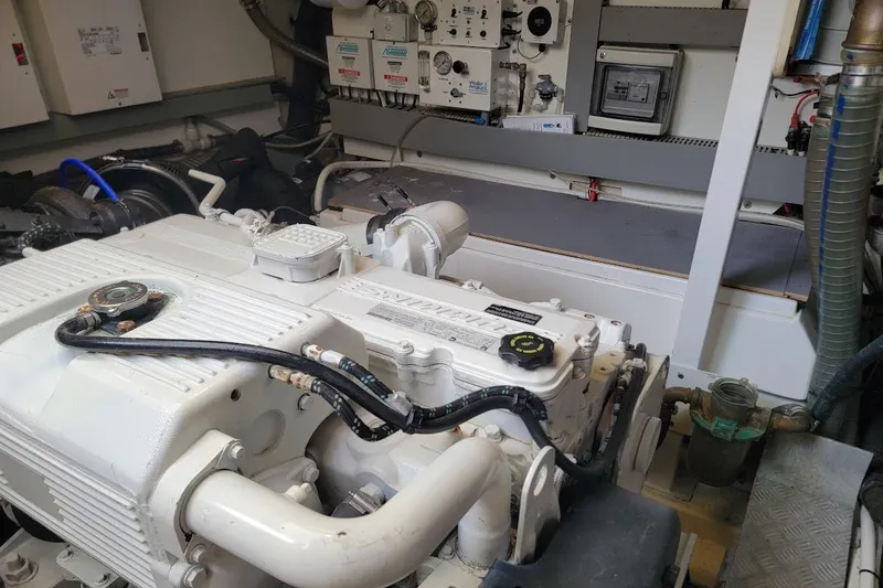 Slide: The Image of Luxurious 2014 Prestige 550 yacht cabin with modern decor and elegant furnishings. - 27