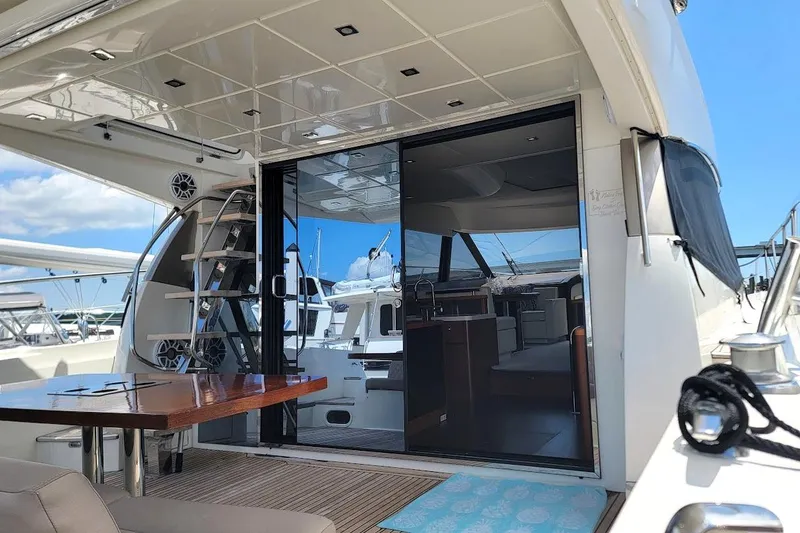 Slide: The Image of Luxurious 2014 Prestige 550 yacht interior with sleek design and modern amenities. - 51