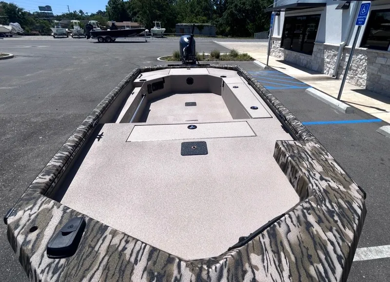 Slide: The Image of Avid 16 Commander 2026 boat displayed in parking lot. - 8