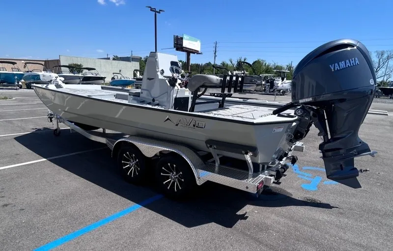 Slide: The Image of 2026 Avid 22 Recon boat with Yamaha engine in parking lot. - 6