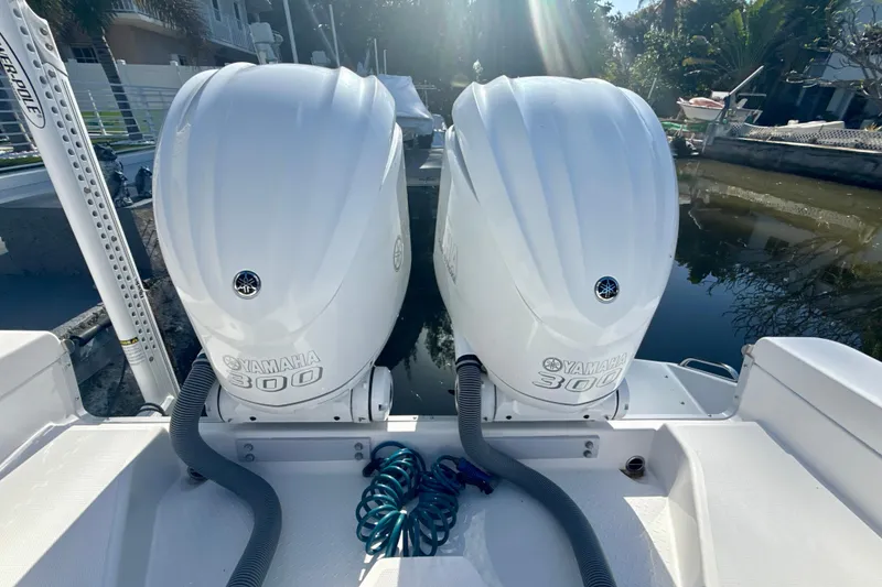 Slide: The Image of Twin Yamaha 300 engines on a 2021 Everglades 273 Center Console boat. - 4