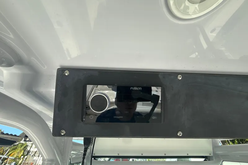 Slide: The Image of Fusion audio system on 2021 Everglades 273 Center Console boat dashboard. - 9