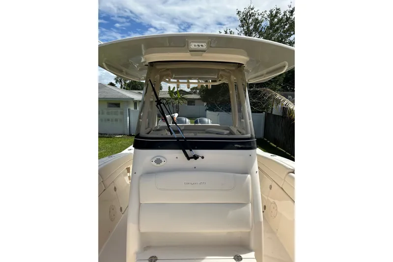 Slide: The Image of 2021 Grady-White Canyon 271 FS boat, featuring a sleek design and spacious deck. - 10