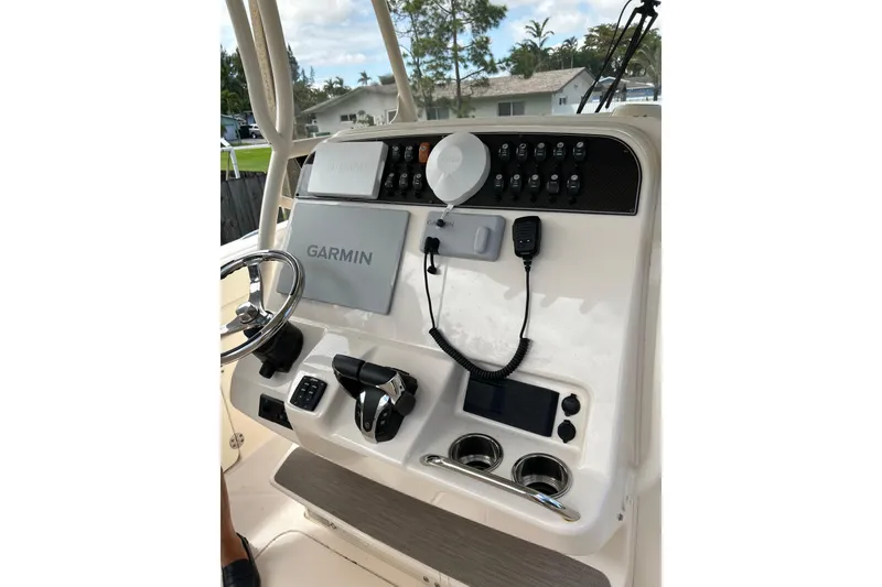 Slide: The Image of 2021 Grady-White Canyon 271 FS boat console with Garmin navigation system. - 13