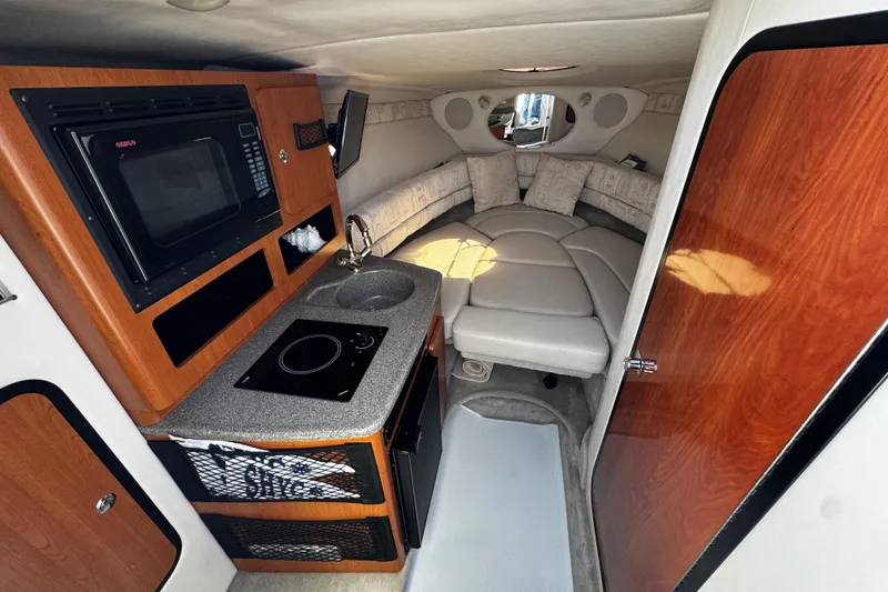 Slide: The Image of 2004 Crownline 250 CR isenglas enclosure and camper canvas - 25