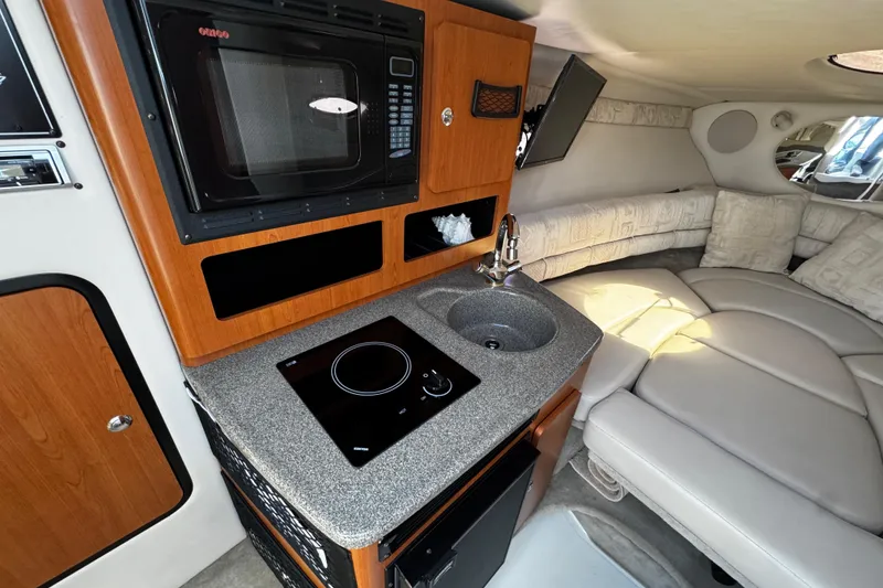 Slide: The Image of 2004 Crownline 250 CR isenglas enclosure and camper canvas - 26
