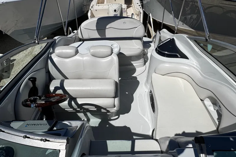 Slide: The Image of Bow of a 2004 Crownline 250 CR boat with anchor and railing. - 62