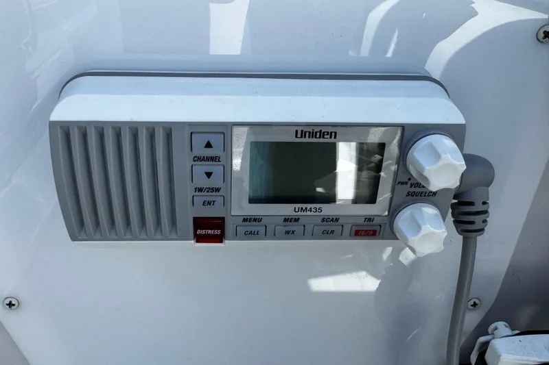 Slide: The Image of Dashboard of a 2004 Crownline 250 CR boat with Garmin navigation system. - 80