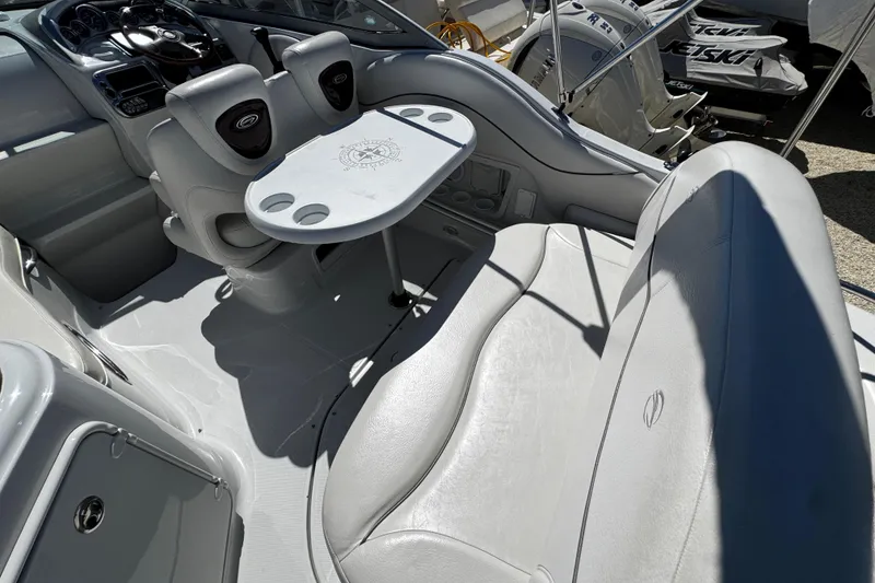 Slide: The Image of Uniden UM435 marine radio on 2004 Crownline 250 CR boat dashboard. - 87