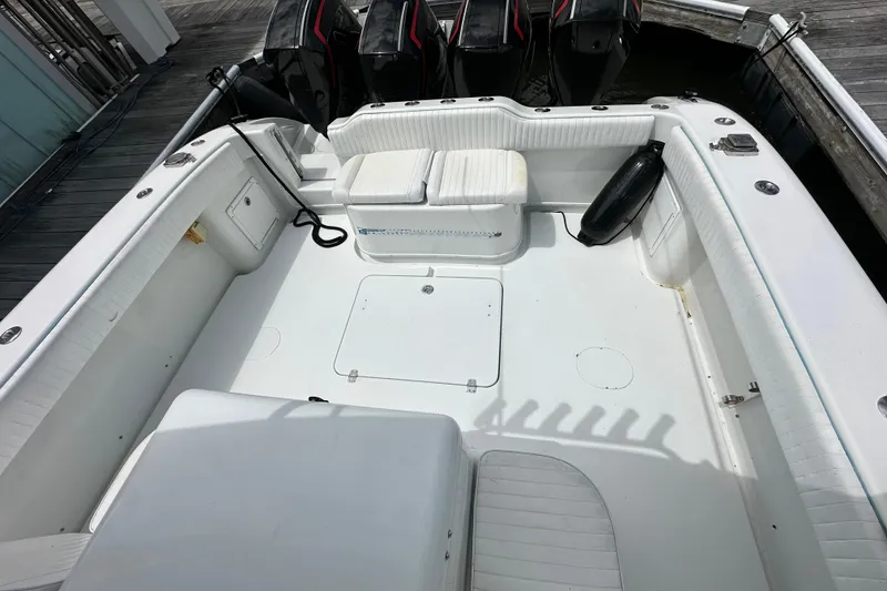 Slide: The Image of 2009 Yellowfin 42 Offshore boat deck with seating and outboard motors. - 26