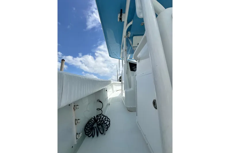 Slide: The Image of 2009 Yellowfin 42 Offshore boat deck with blue sky background. - 30