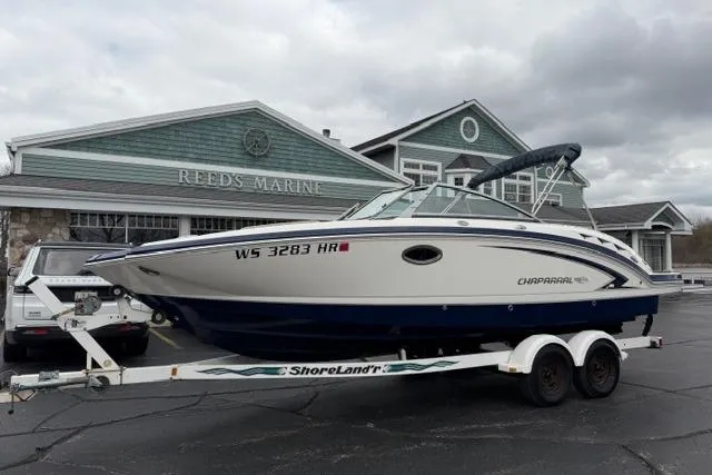 The Image of 2010 Chaparral Sunesta 244 boat on trailer at Reeds Marine dealership. - 1