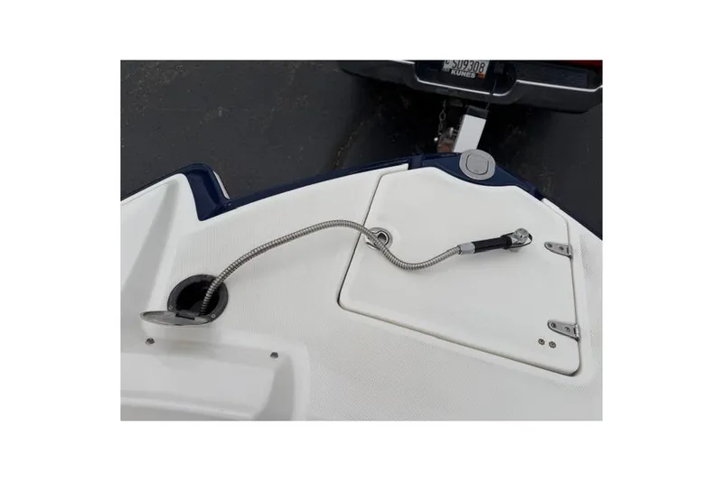 Slide: The Image of 2010 Chaparral Sunesta 244 boat deck with hose and storage compartment. - 37