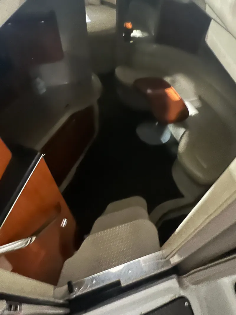 Slide: The Image of Interior of a 2001 Sea Ray 380 Sundancer yacht with elegant furnishings. - 10