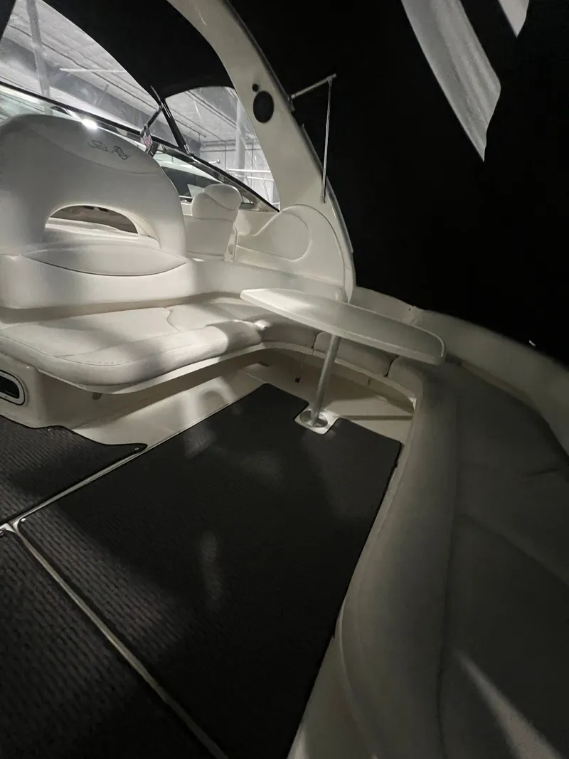 Slide: The Image of Interior of a 2001 Sea Ray 380 Sundancer yacht with seating area. - 12