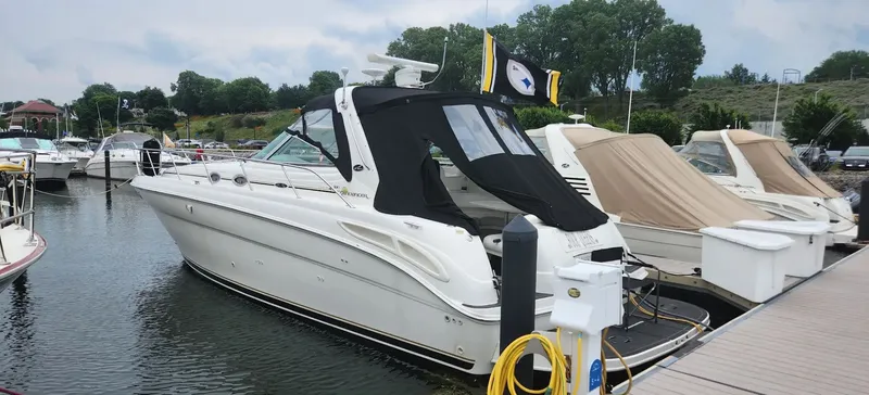 Slide: The Image of 2001 Sea Ray 380 Sundancer yacht docked at marina. - 3