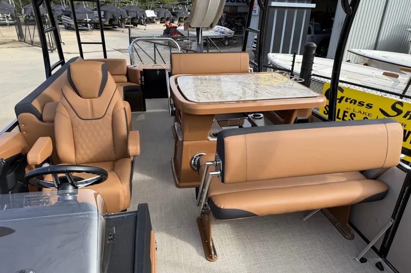 Slide: The Image of Luxurious interior of 2026 Avalon Catalina Entertainer Funship with plush seating and elegant table. - 18