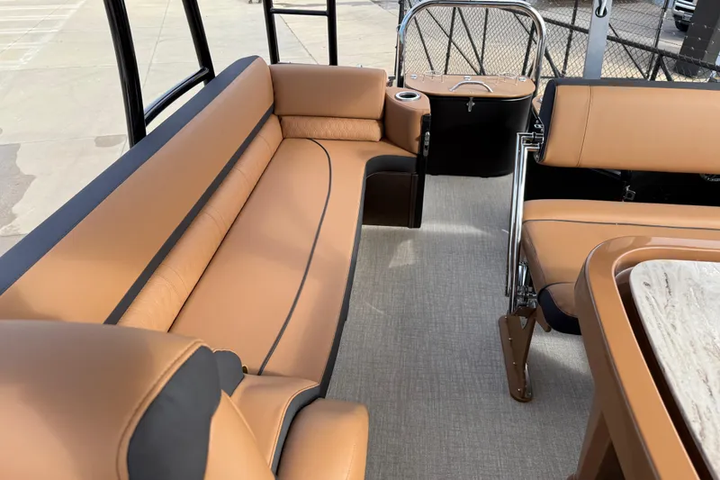 Slide: The Image of Luxurious seating on 2026 Avalon Catalina Entertainer Funship, featuring tan upholstery and modern design. - 28