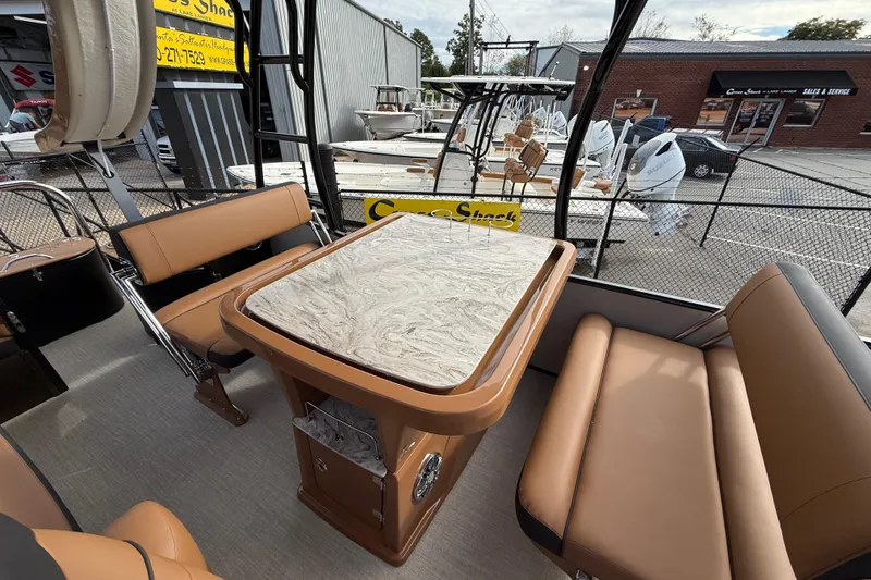 Slide: The Image of 2026 Avalon Catalina Entertainer Funship interior with elegant seating and marble-style table. - 29