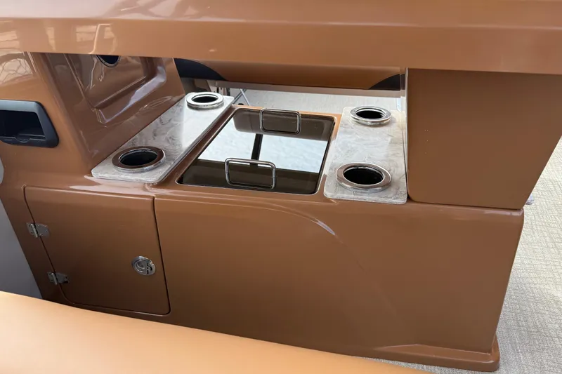 Slide: The Image of Interior of 2026 Avalon Catalina Entertainer Funship with cup holders and storage compartments. - 34