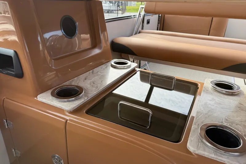 Slide: The Image of Interior of 2026 Avalon Catalina Entertainer Funship with cup holders and seating area. - 36