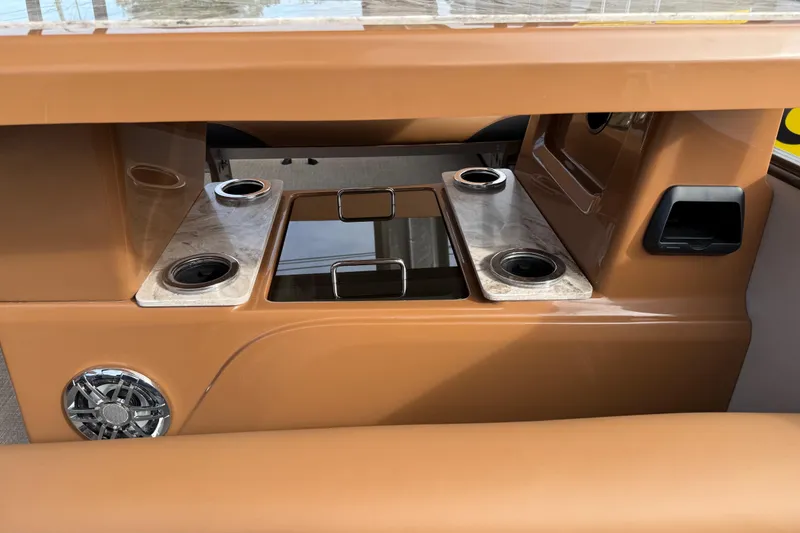 Slide: The Image of 2026 Avalon Catalina Entertainer Funship interior with cup holders and speaker. - 40