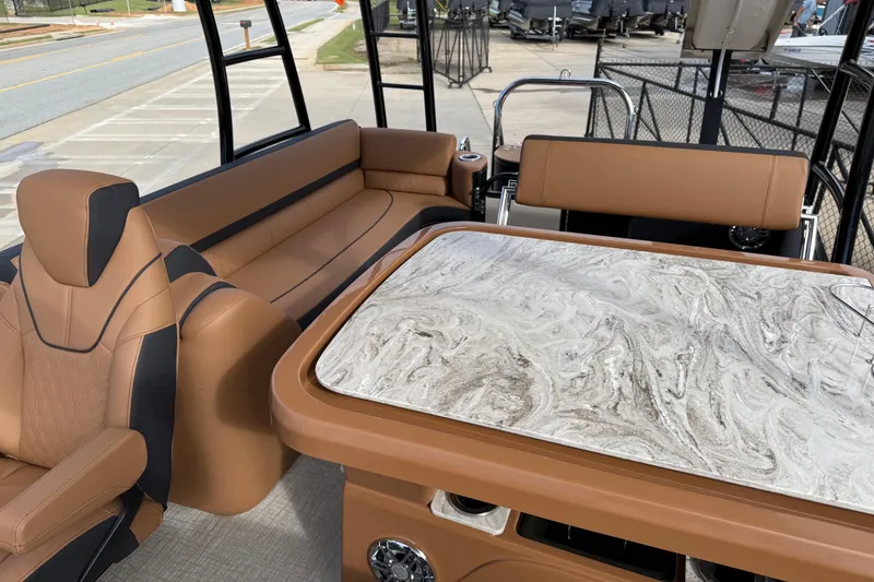 Slide: The Image of Luxurious interior of 2026 Avalon Catalina Entertainer Funship with elegant seating and marble-style table. - 42