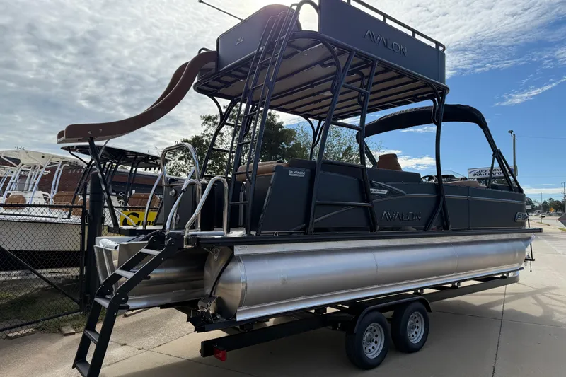 Slide: The Image of 2026 Avalon Catalina Entertainer Funship pontoon boat with slide on trailer. - 9