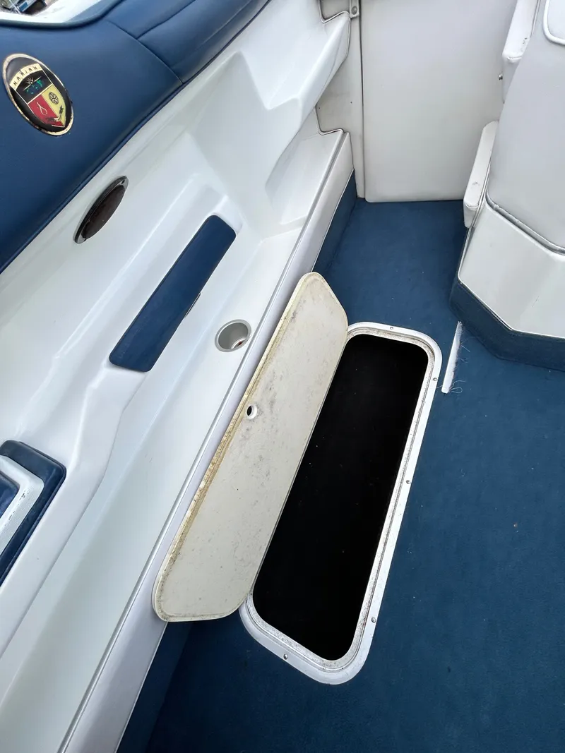 Slide: The Image of Open storage compartment in 1993 Mariah MX20 C boat. - 27
