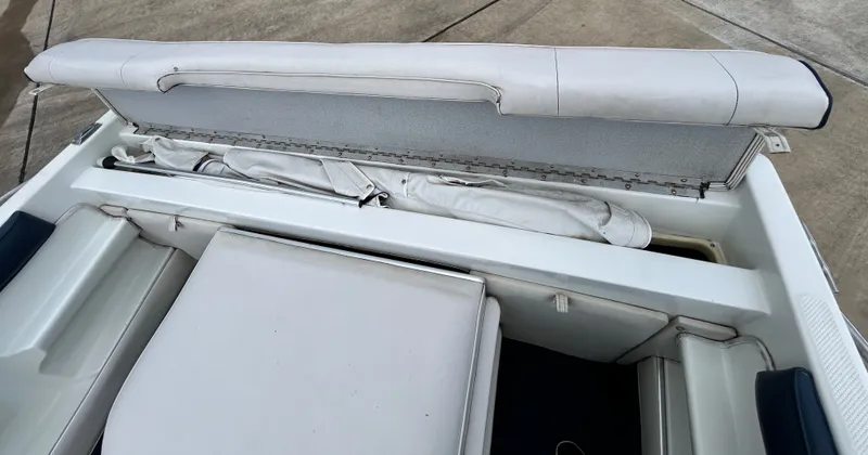 Slide: The Image of Interior of a 1993 Mariah MX20 C boat with seating bench. - 31