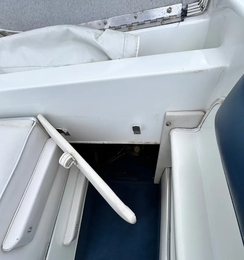 Slide: The Image of Interior of a 1993 Mariah MX20 C boat, white upholstery. - 36
